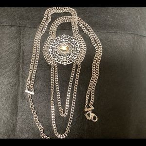 Chico’s Medallion long necklace.